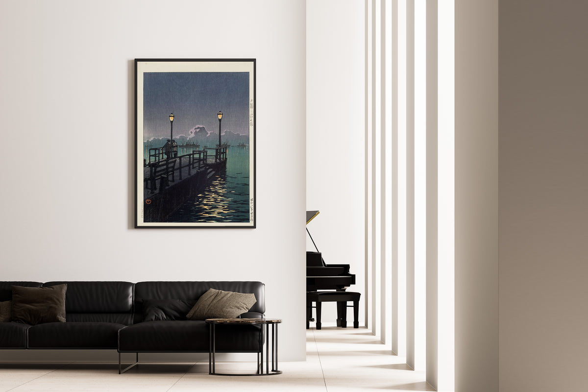 Framed art print of Pier at Otaru by Kawase Hasui, on the wall of a minimal living room