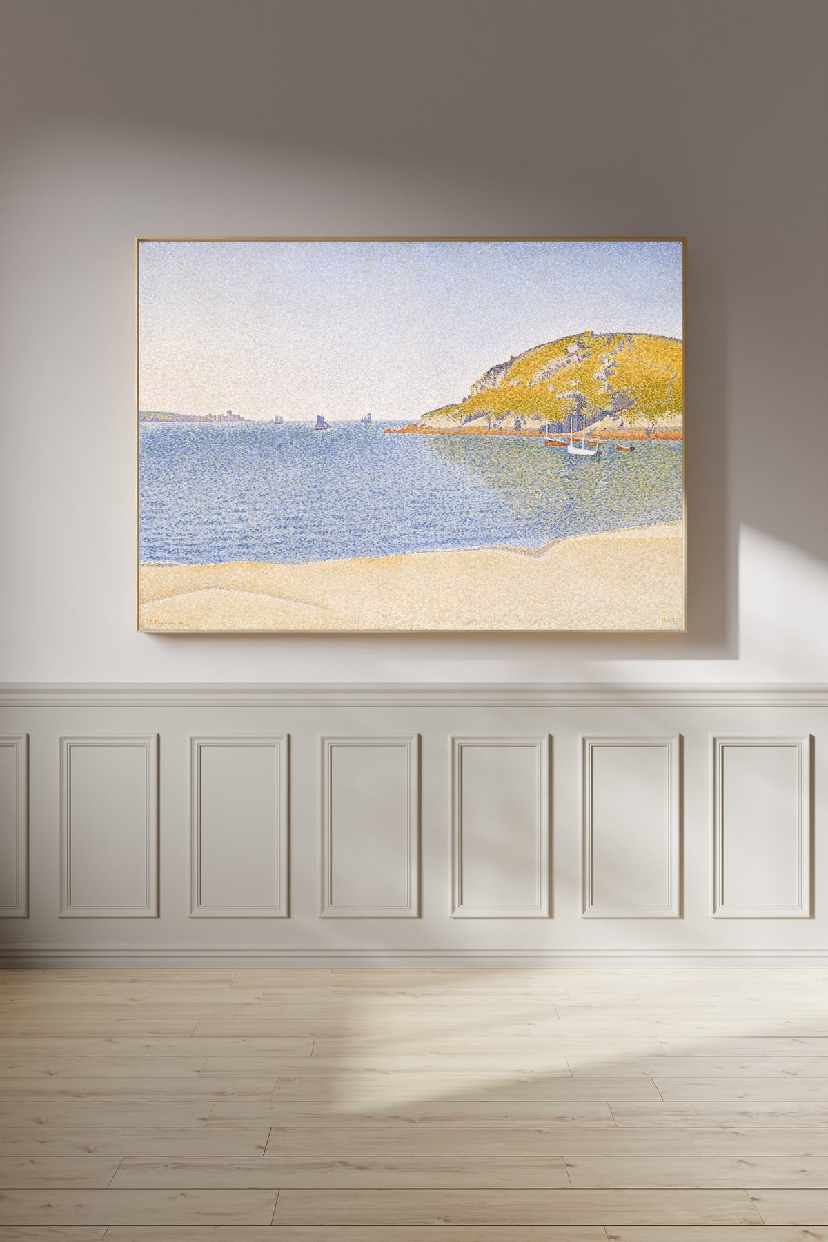 Framed art print of Port of Saint-Cast by Paul Signac, on a panelled wall in afternoon light