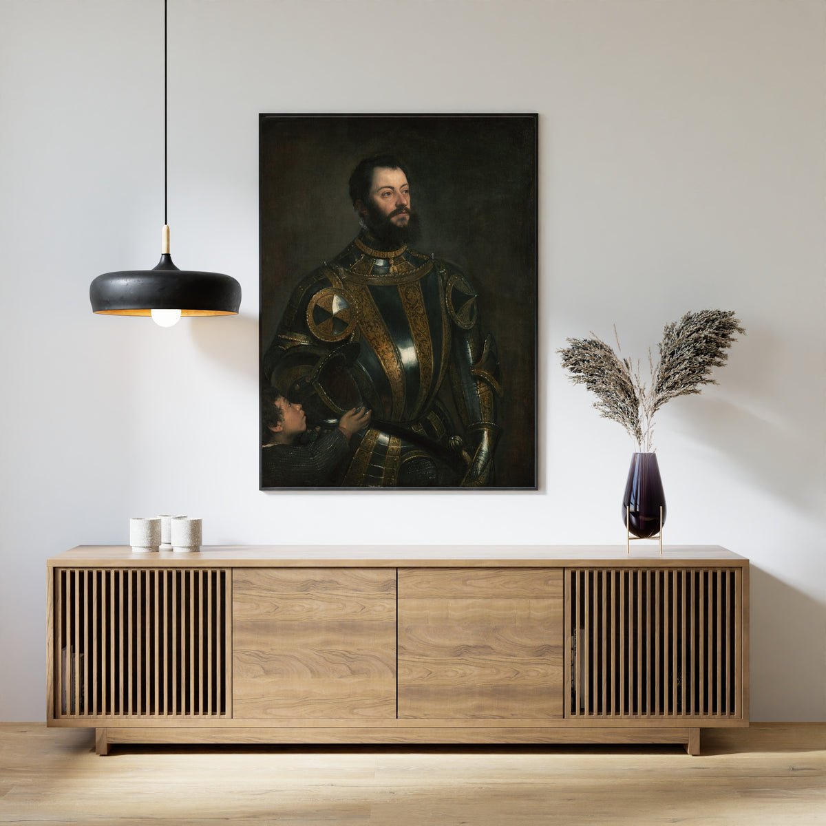 Framed art print of Portrait of Alfonso d’Avalos, Marchese del Vasto, in Armor with a Page by Titian, above a slatted wood sideboard