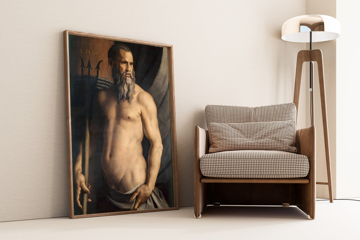 Framed art print of Portrait of Andrea Doria as Neptune by Bronzino, leaning against a wall beside an armchair and a floor lamp