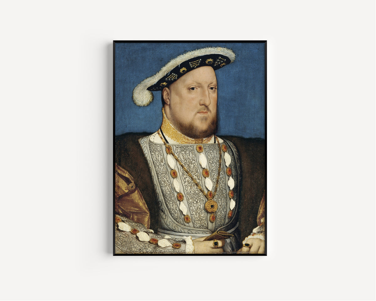 Framed art print of Portrait of Henry VIII by Hans Holbein the Younger, in a slim black frame on a plain white wall
