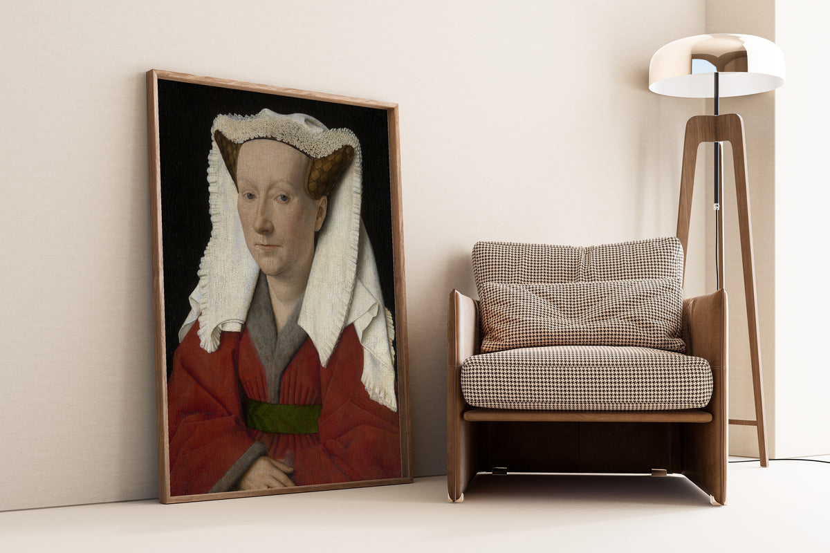 Framed art print of Portrait of Margareta van Eyck by Jan van Eyck, leaning against a wall beside an armchair and a floor lamp