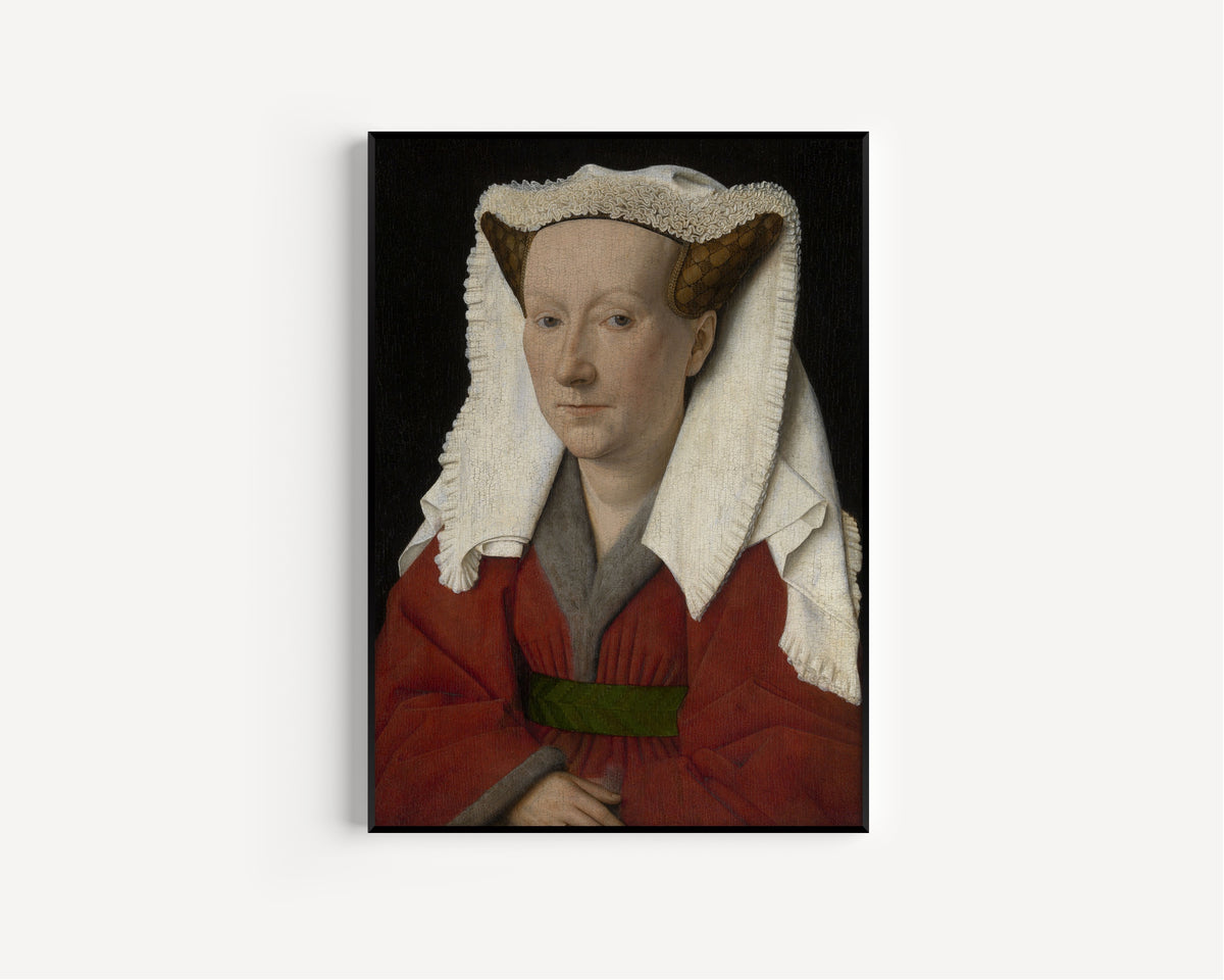 Framed art print of Portrait of Margareta van Eyck by Jan van Eyck, in a slim black frame on a plain white wall