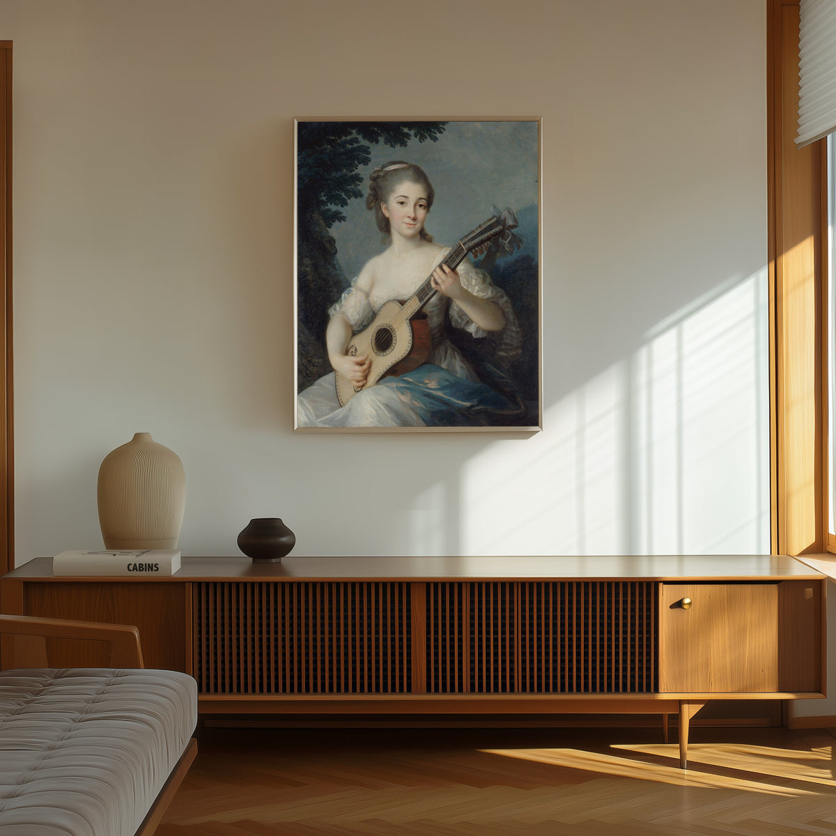 Framed art print of Portrait of… by Élisabeth Louise Vigée Le Brun, in a thin light frame on a sunlit wall above a wooden sideboard
