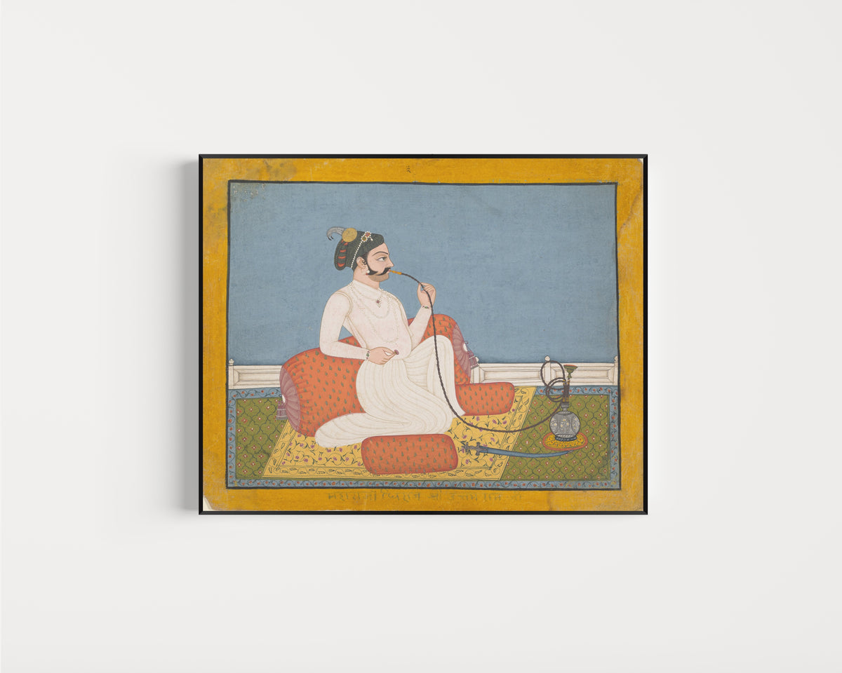 Framed art print of Portrait of Thakur Utham Ram by Jhilai school, in a slim black frame on a plain white wall