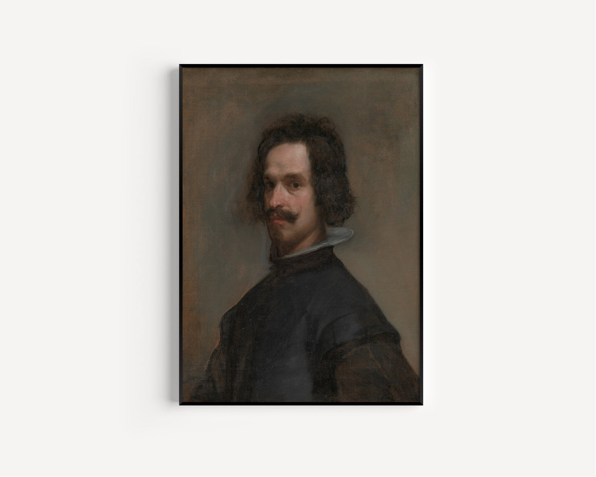 Framed art print of Portrait of a Man, Possibly a Self-Portrait by Diego Velázquez, in a slim black frame on a plain white wall