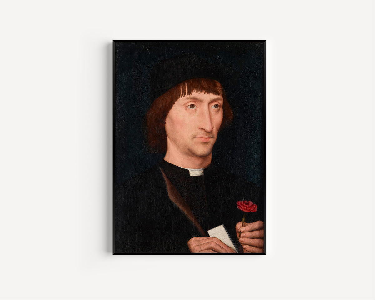 Framed art print of Portrait of a Man with a Pink by Hans Memling, in a slim black frame on a plain white wall