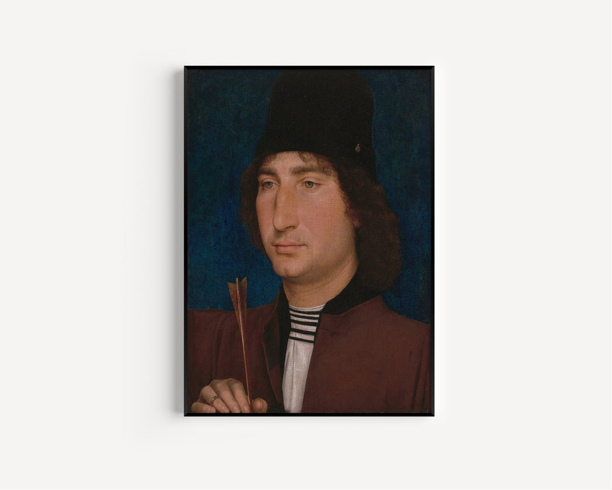 Framed art print of Portrait of a Man with an Arrow by Hans Memling, in a slim black frame on a plain white wall