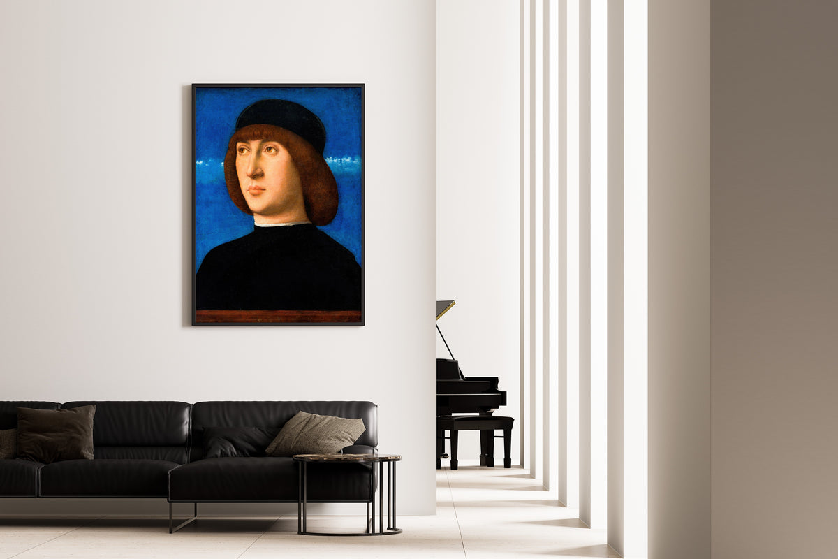 Framed art print of Portrait of a Young Man by Giovanni Bellini, on the wall of a minimal living room