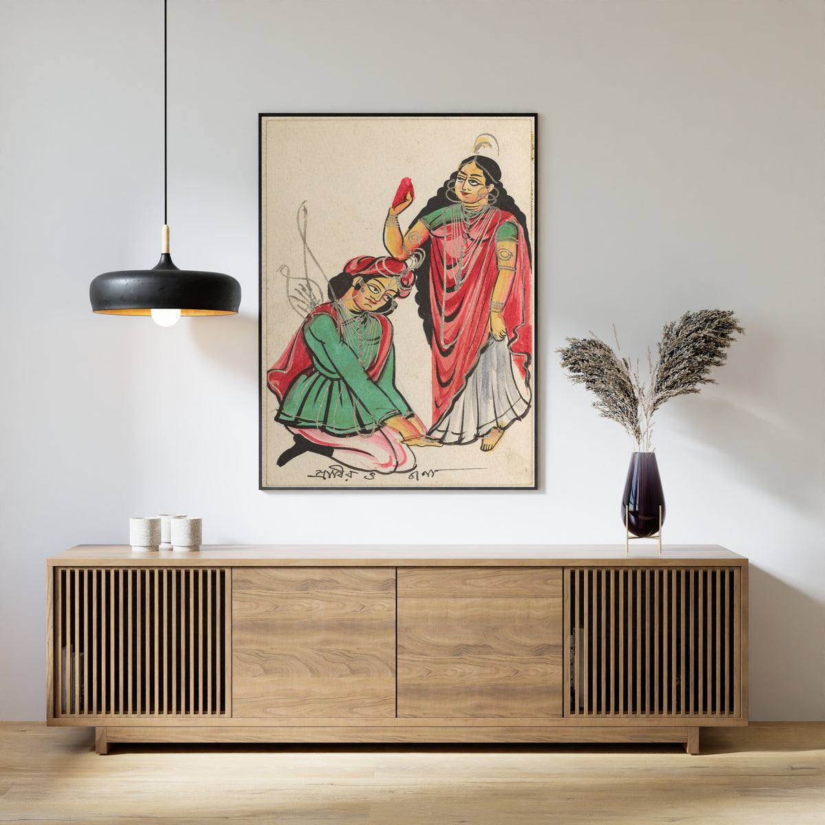 Framed art print of Pravira Kneeling at the Feet of Jana by Kalighat painter, above a slatted wood sideboard