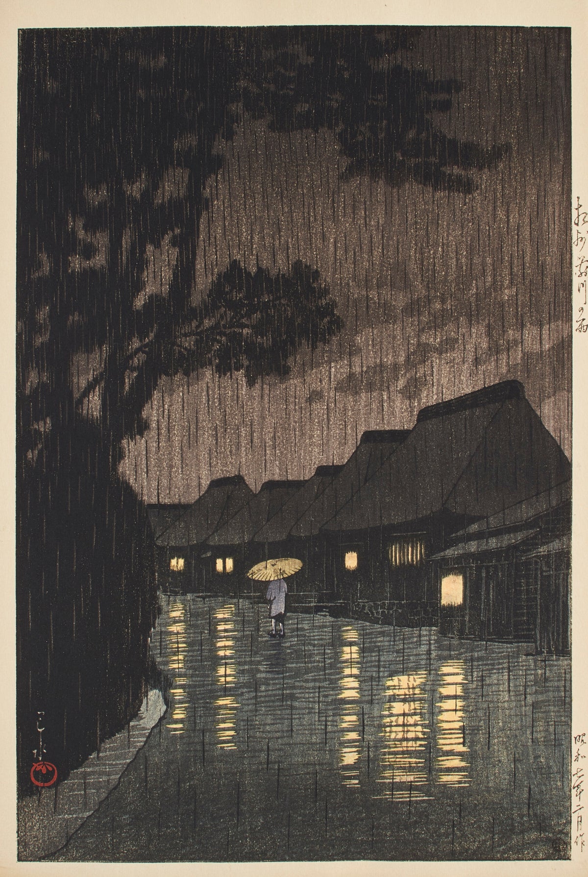 Rain at Maekawa, Sagami Province by Kawase Hasui — One umbrella on a rain-drenched street of lit windows