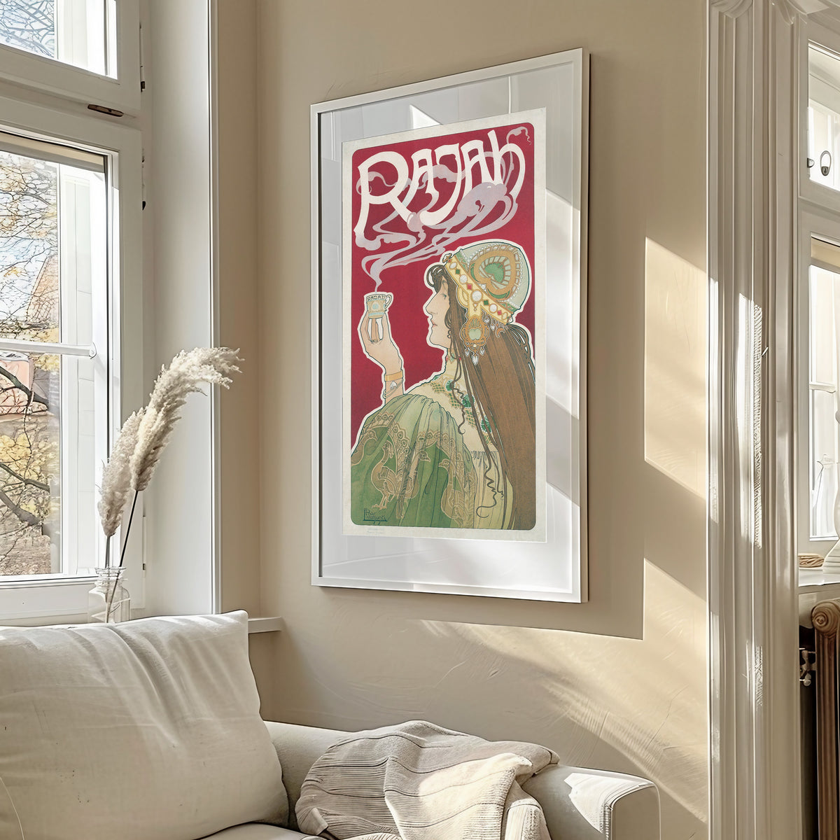 Framed art print of Rajah by Henri Privat-Livemont, in a sunlit living room above a sofa