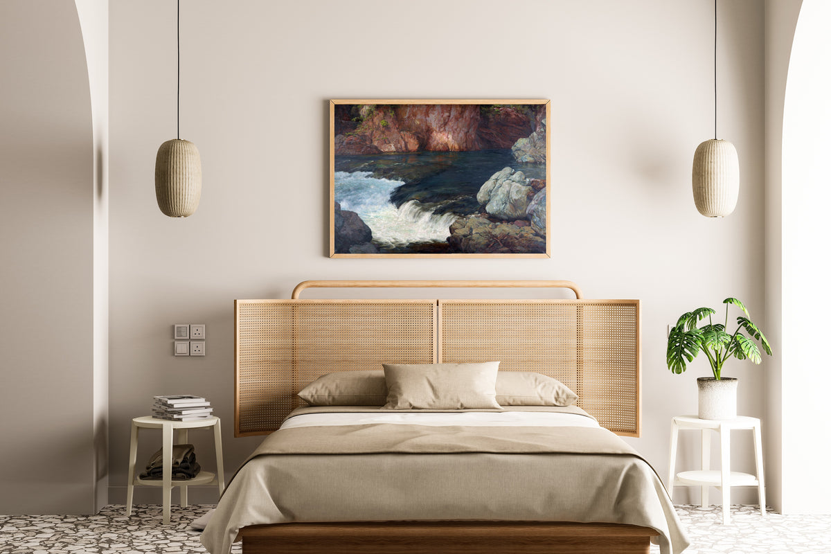 Framed art print of Rapids (1910) by Hiroshi Yoshida, above a cane-headboard bed