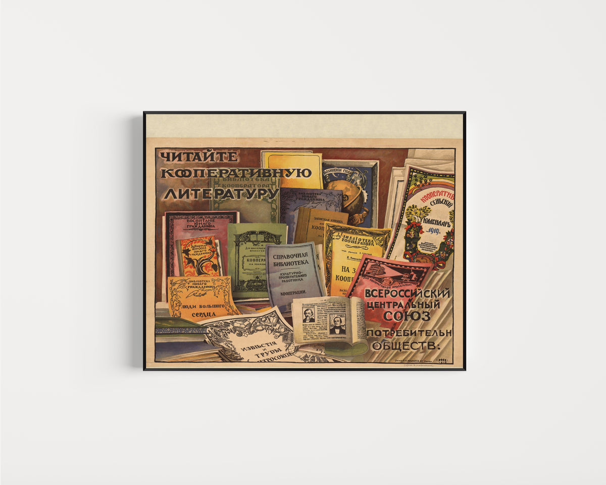 Framed art print of Read Cooperative Literature by Ignaty Nivinsky, in a slim black frame on a plain white wall