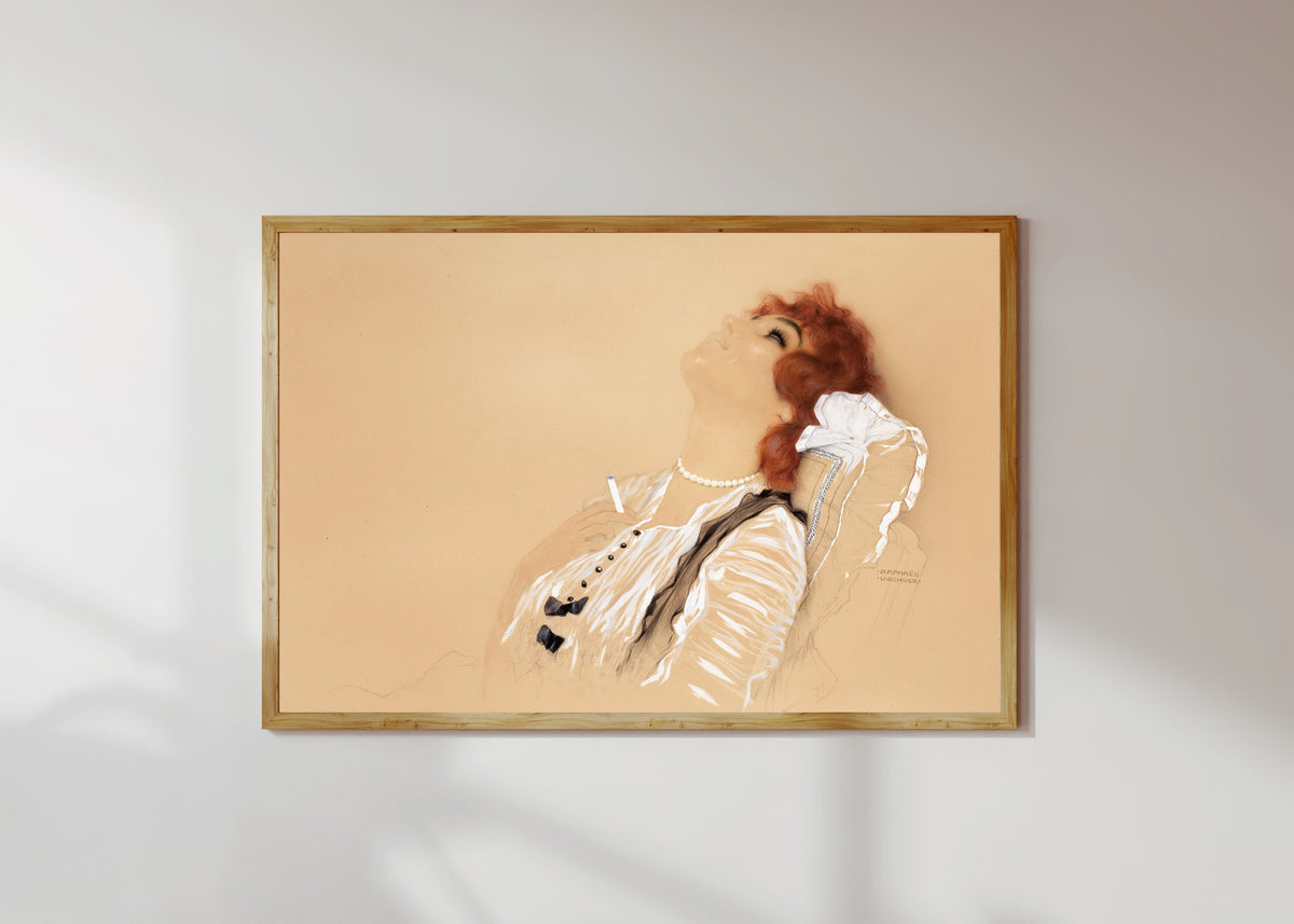 Framed art print of Redhead with a Cigarette by Raphael Kirchner, in a light wood frame on a sunlit white wall