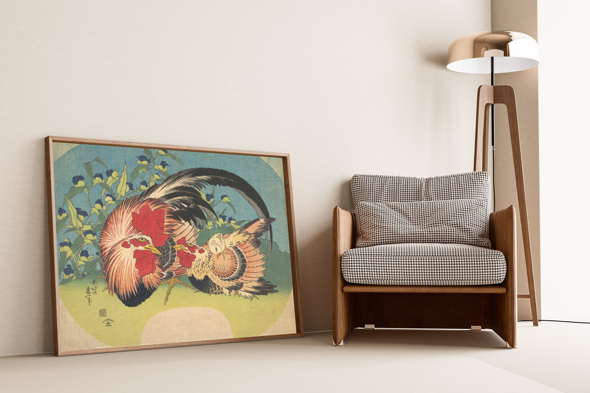 Framed art print of Rooster, Hen and Chicken with Spiderwort by Katsushika Hokusai, leaning against a wall beside an armchair and a floor lamp