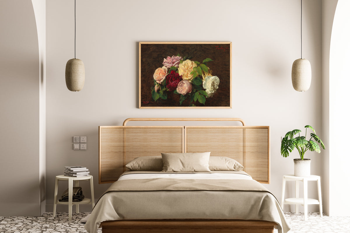 Roses de Nice on a Table by Henri Fantin-Latour — framed above a cane-headboard bed