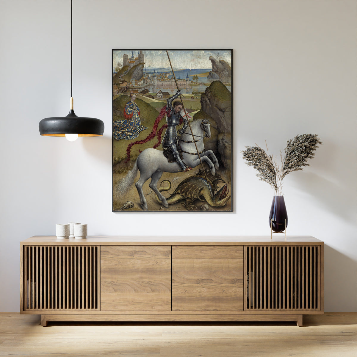 Framed art print of Saint George and the Dragon by Rogier van der Weyden, above a slatted wood sideboard