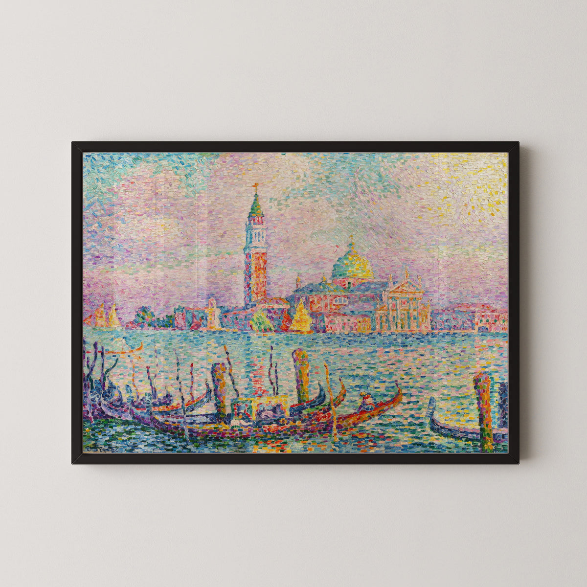 Framed art print of Saint-Georges, Sunset, Venice by Paul Signac, in a black frame on a pale wall