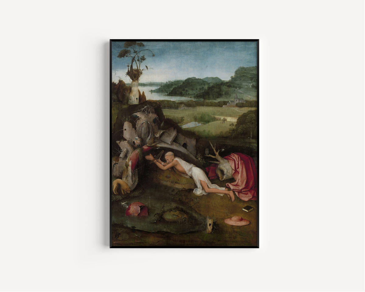 Framed art print of Saint Jerome by Hieronymus Bosch, in a slim black frame on a plain white wall