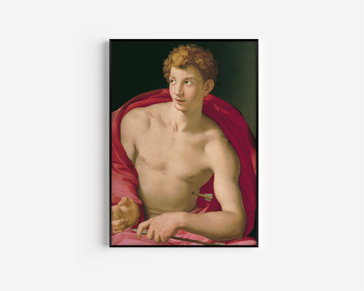 Framed art print of Saint Sebastian by Bronzino, in a slim black frame on a plain white wall