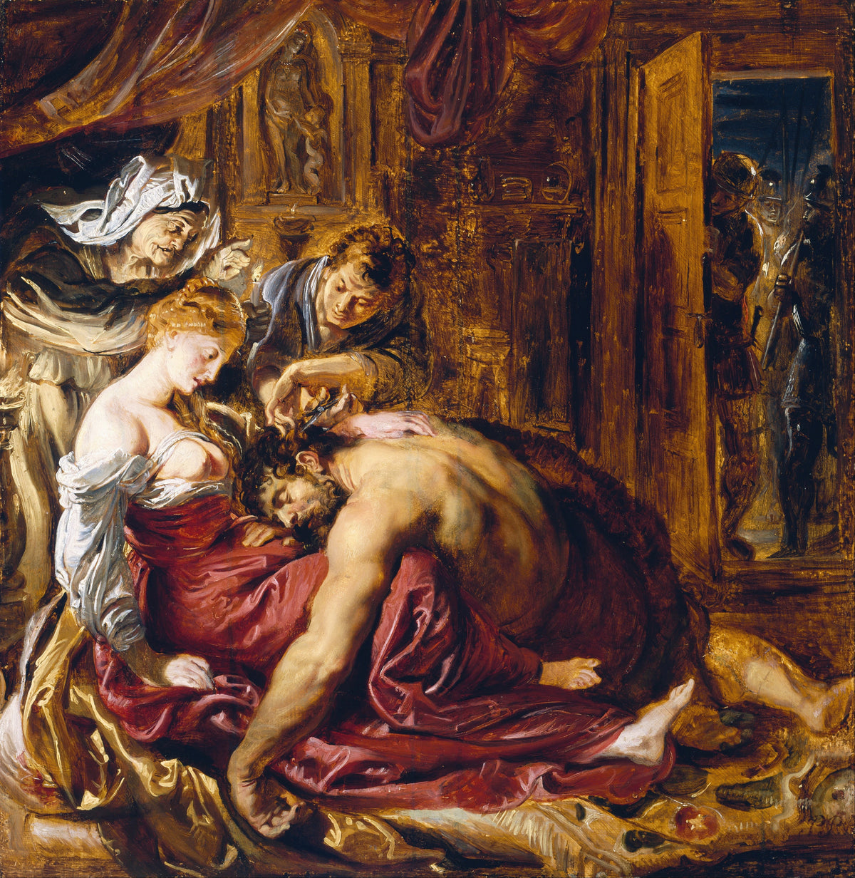Samson and Delilah by Peter Paul Rubens — A man sleeps in a woman's lap as a young man cuts his hair