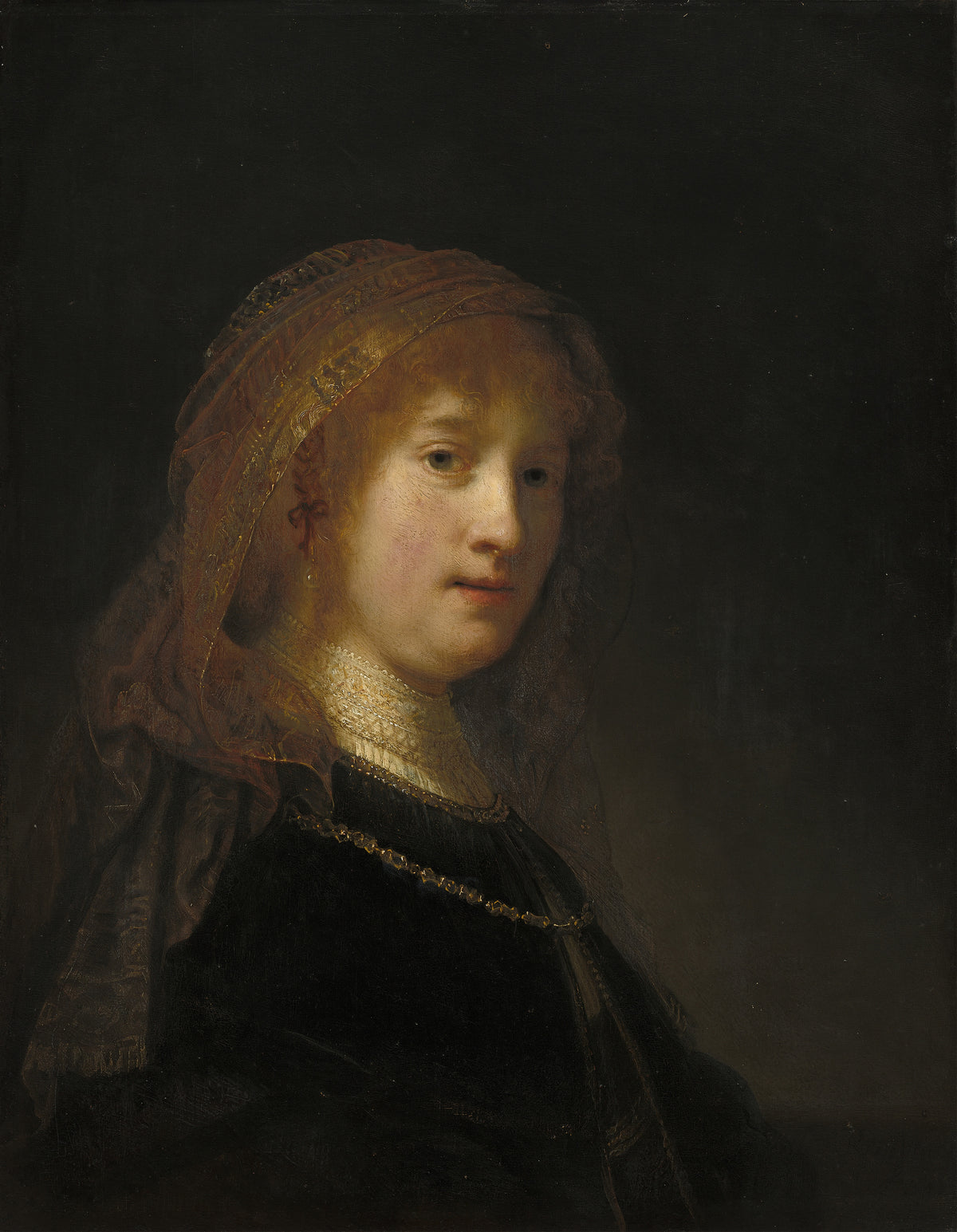 Saskia van Uylenburgh, the Wife of the Artist by Rembrandt van Rijn — A young woman with reddish-gold hair under a gold-edged veil