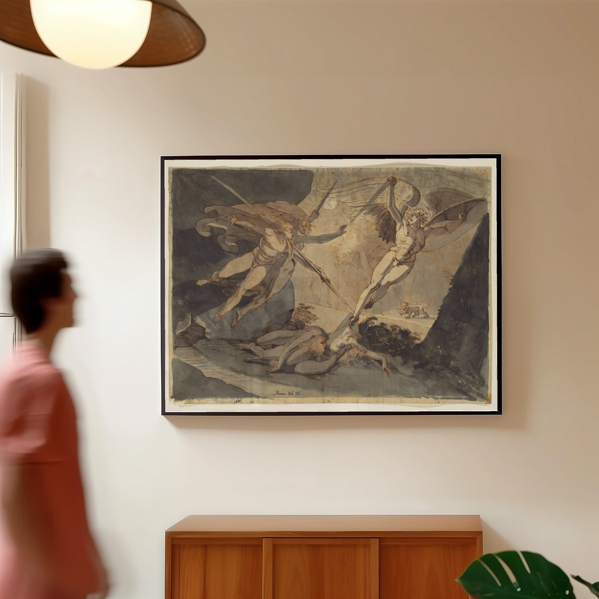 Framed art print of Satan Starts from the Touch of Ithuriel's Spear by Henry Fuseli, in a slim black frame on a warm wall in a sunlit room