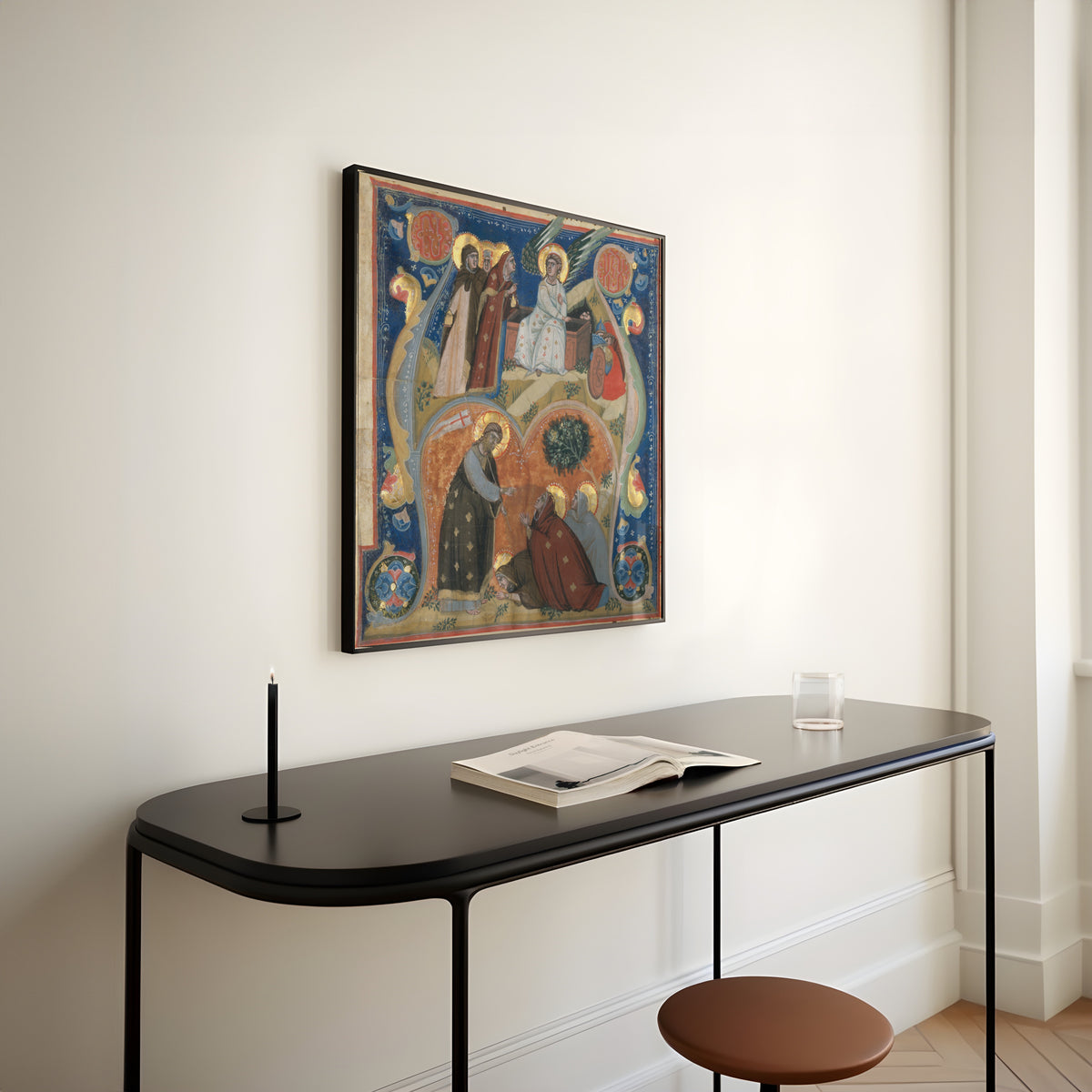 Framed art print of Scenes of Easter in an Initial A by Nerius, above a slim black console table