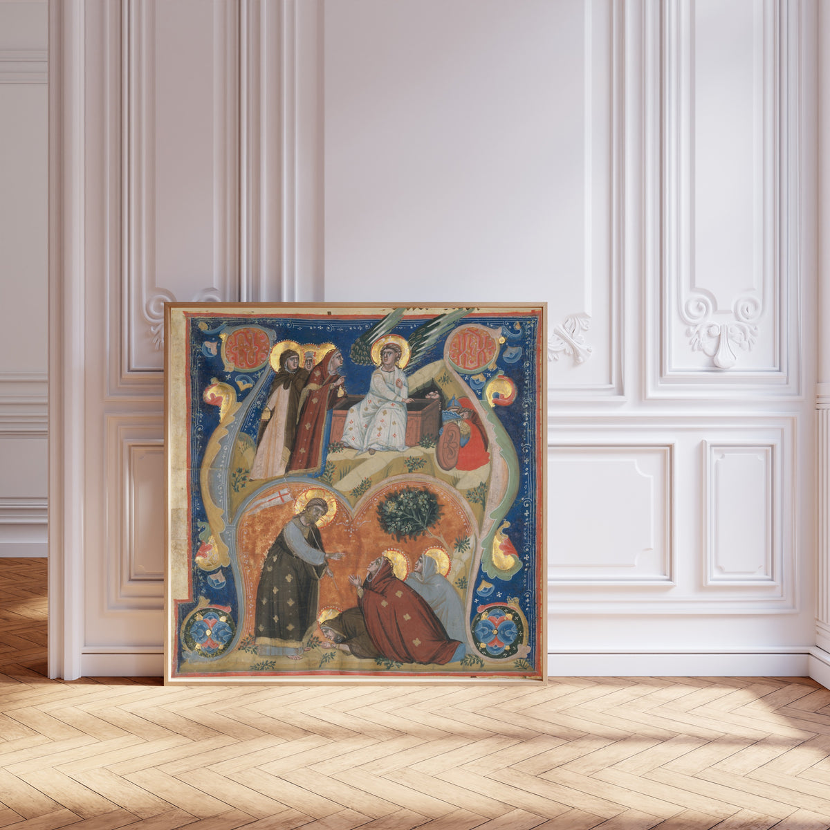 Framed art print of Scenes of Easter in an Initial A by Nerius, leaning against pale pink panelling on a herringbone floor
