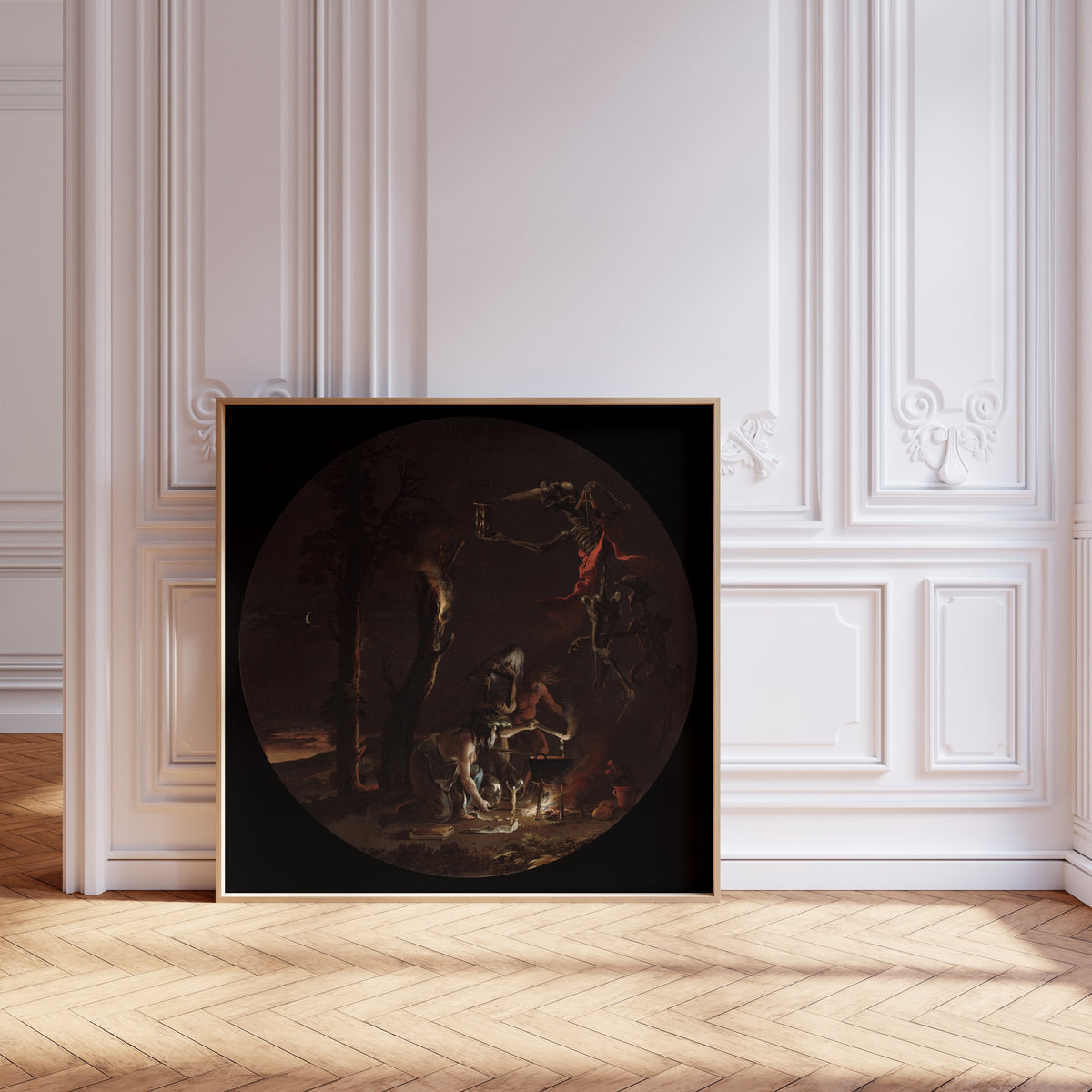 Framed art print of Scenes of Witchcraft: Evening by Salvator Rosa, leaning against pale pink panelling on a herringbone floor
