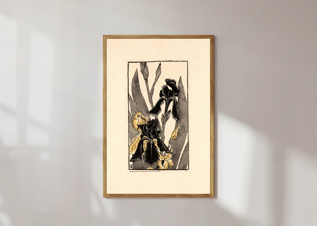 Framed art print of Schwertlilien by Otto Eckmann, in a light wood frame on a sunlit white wall
