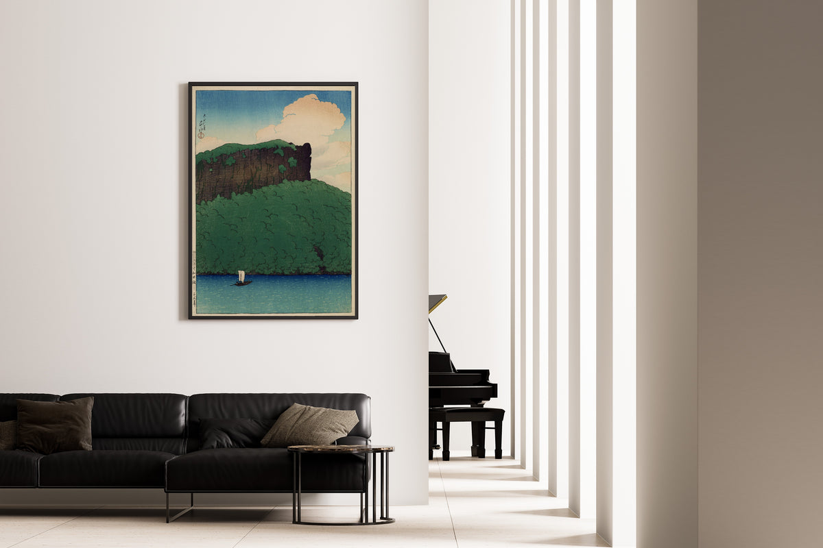 Framed art print of Senjo Cliff, Lake Towada by Kawase Hasui, on the wall of a minimal living room