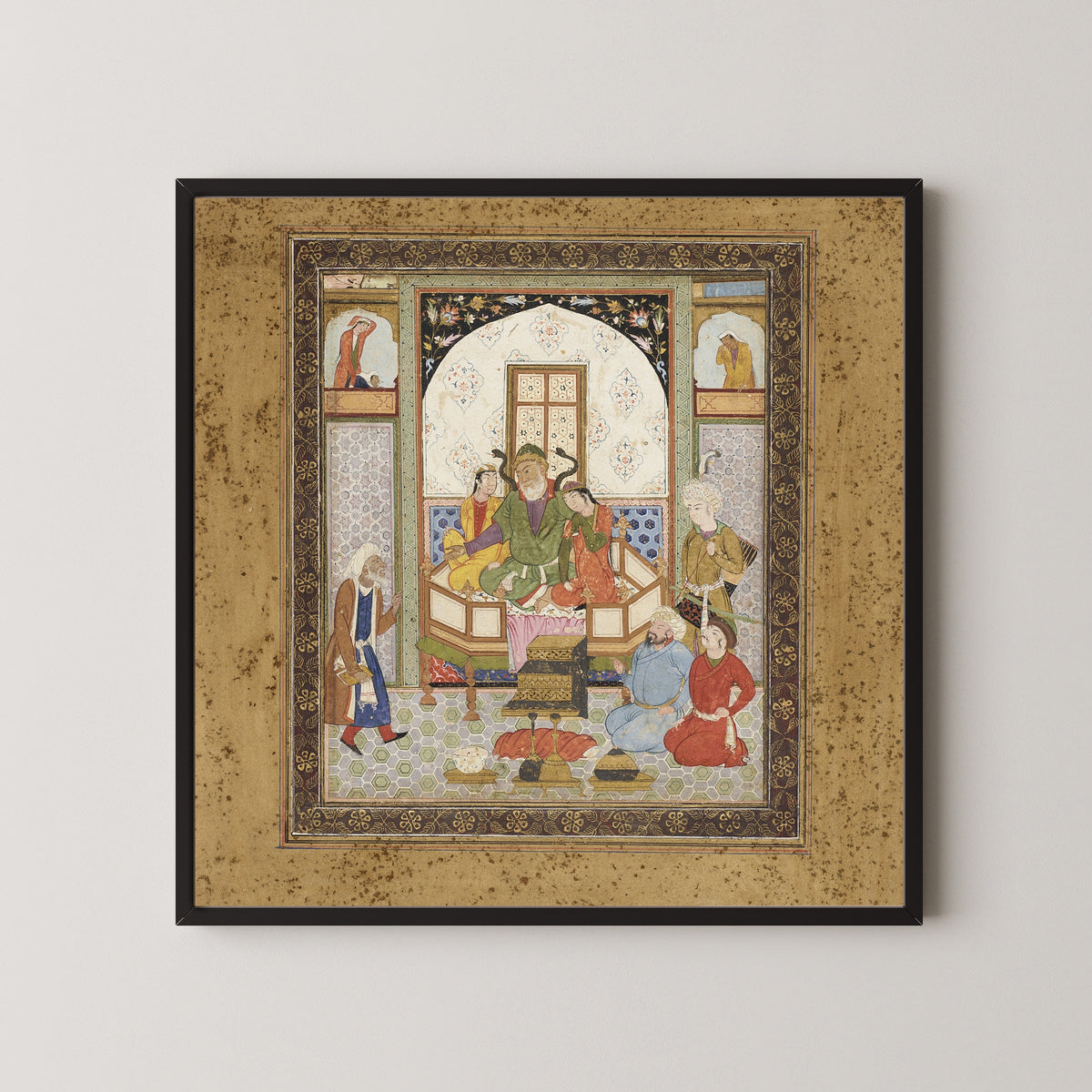 Framed art print of Shahnama: Zahhak Enthroned with the Two Daughters of Jamshid, in a black frame on a pale wall