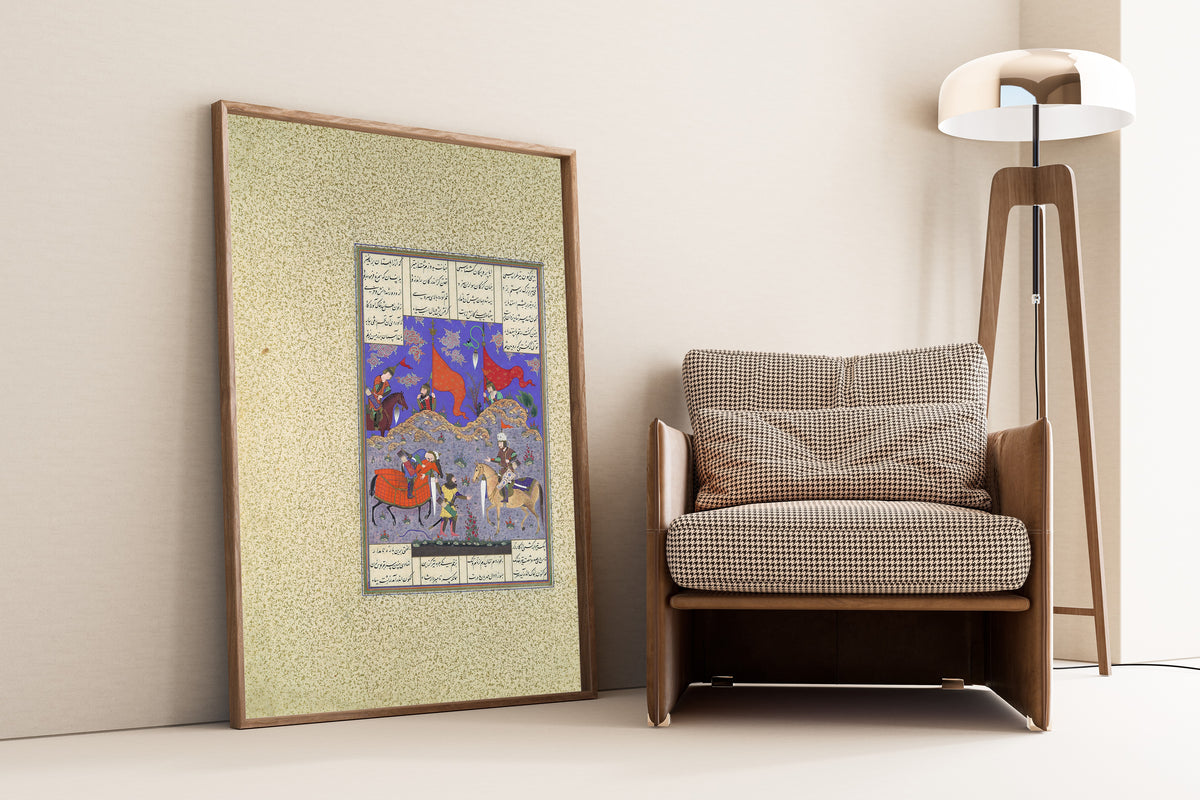 Framed art print of Shahnama of Shah Tahmasp: Rustam Slays Isfandiyar by Qasim ibn Ali (attributed), leaning against a wall beside an armchair and a floor lamp