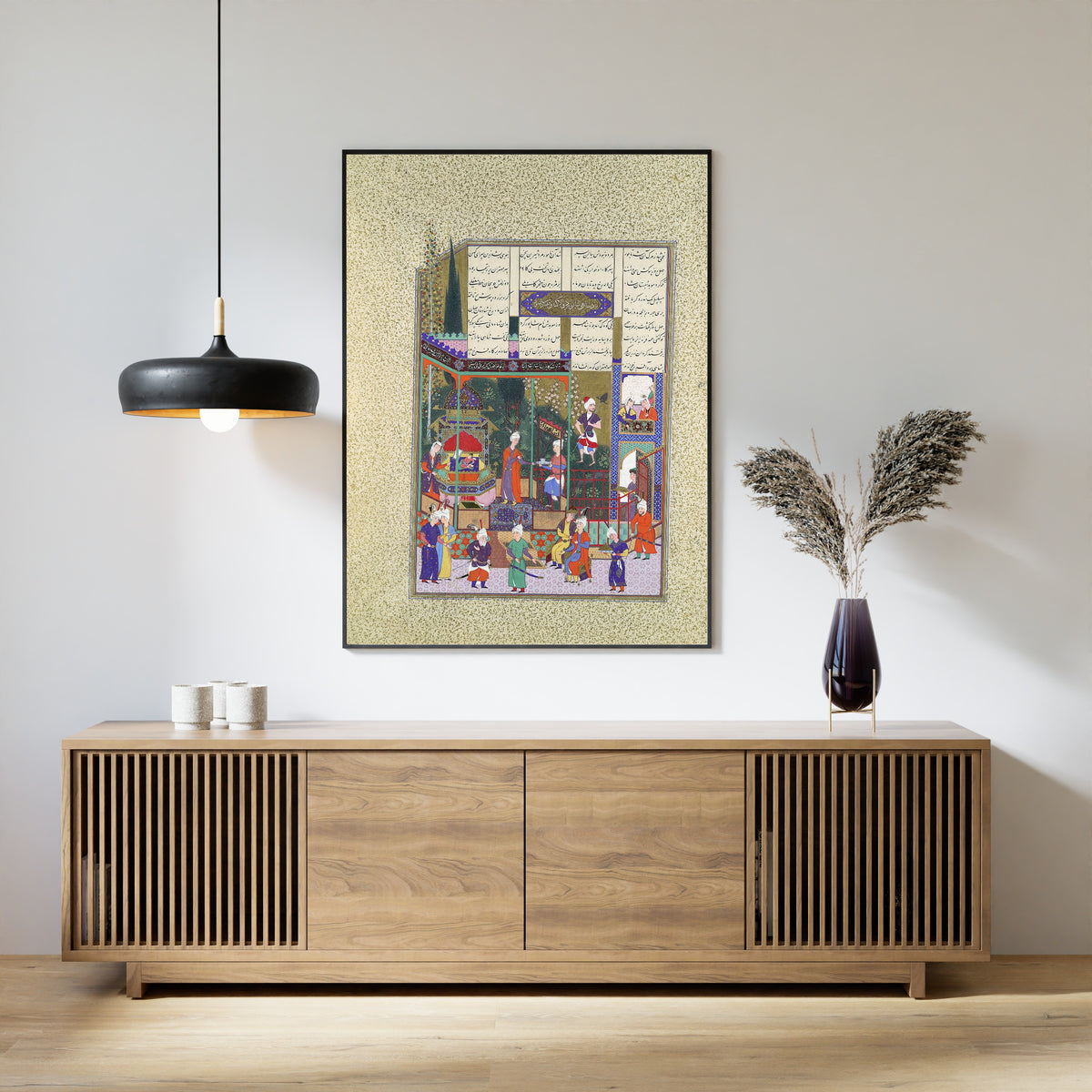 Framed art print of Shahnama of Shah Tahmasp: The Coronation of the Infant Shapur II by Muzaffar Ali (attributed), above a slatted wood sideboard