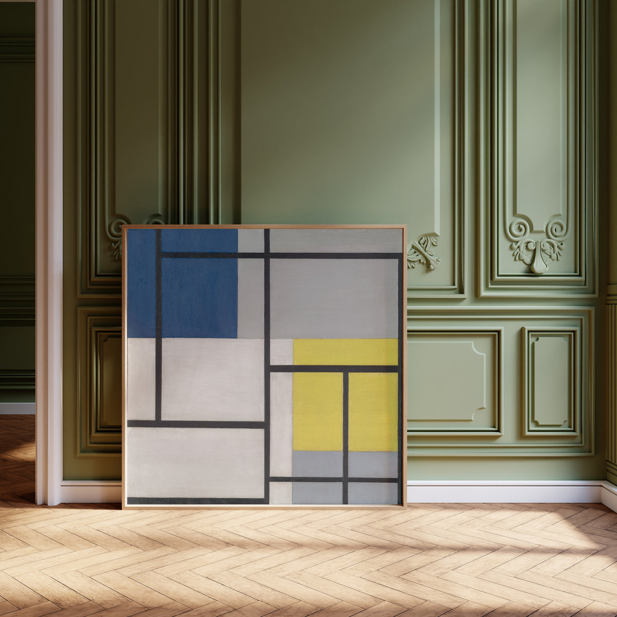 Framed art print of Simultaneous Composition by Theo van Doesburg, leaning against olive-green panelling on a herringbone floor