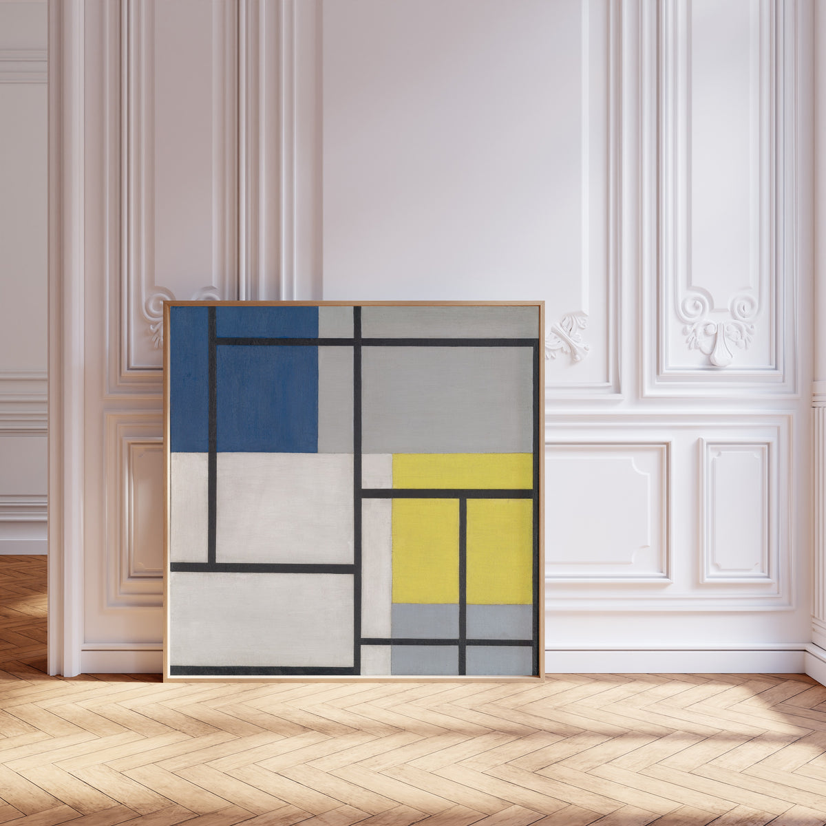 Framed art print of Simultaneous Composition by Theo van Doesburg, leaning against pale pink panelling on a herringbone floor