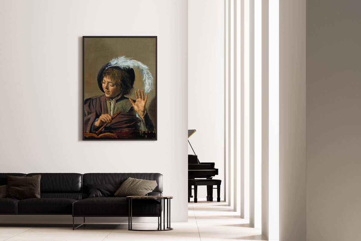 Framed art print of Singing Boy with Flute by Frans Hals, on the wall of a minimal living room