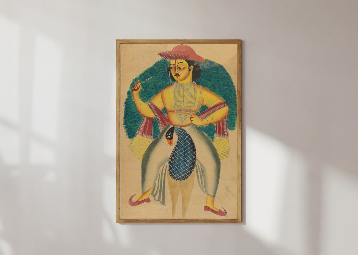 Framed art print of Skanda on his peacock by Kalighat painter, in a light wood frame on a sunlit white wall