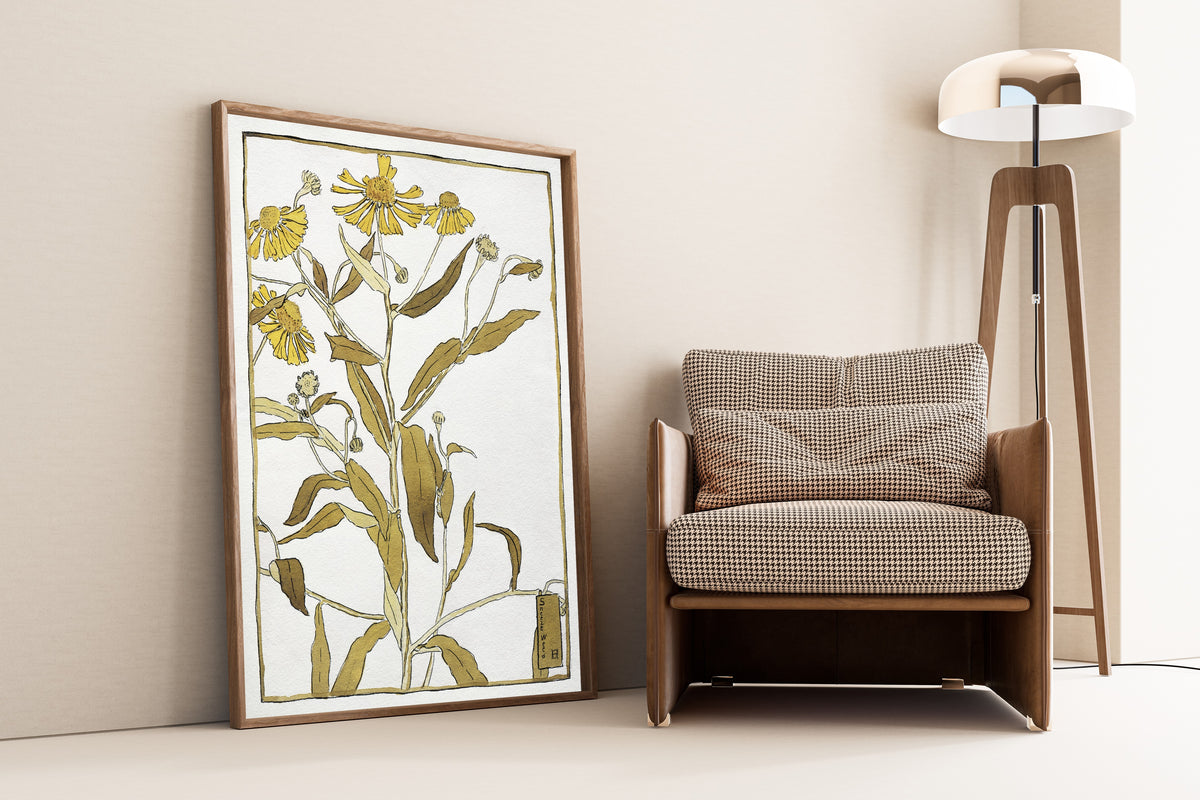 Sneeze Weed by Hannah Borger Overbeck — framed and leaning against a wall beside an armchair and a floor lamp