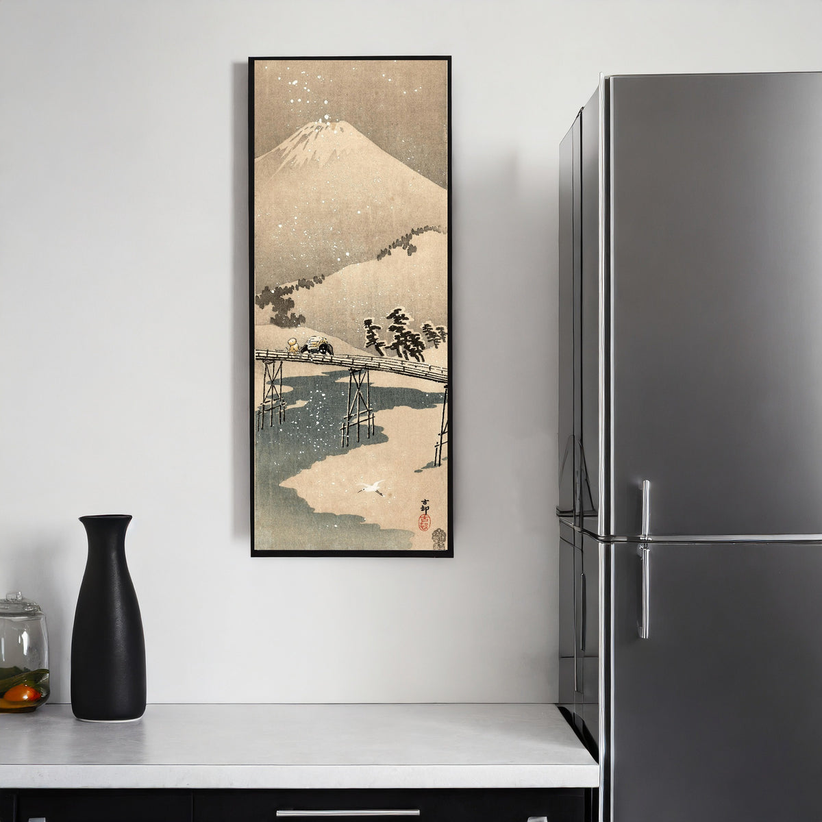 Framed art print of Snowy Landscape with Mount Fuji by Ohara Koson, on a kitchen wall