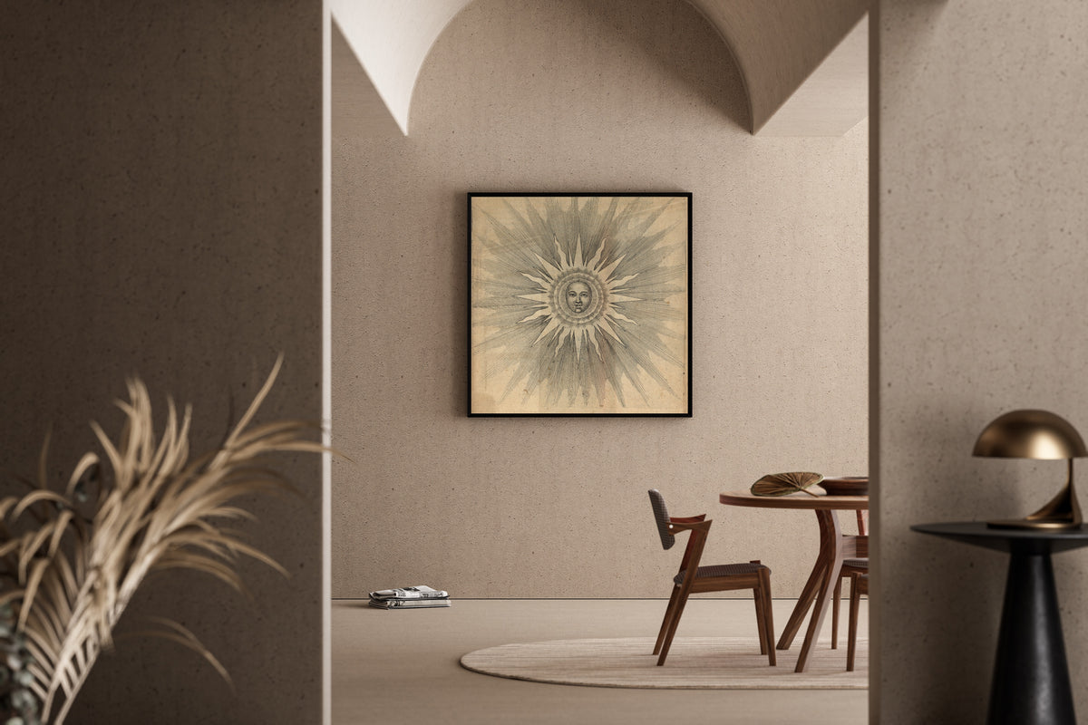 Framed art print of Solis: the Sun with a Face (Utriusque Cosmi, p. 19) by Robert Fludd, in a sunlit dining corner