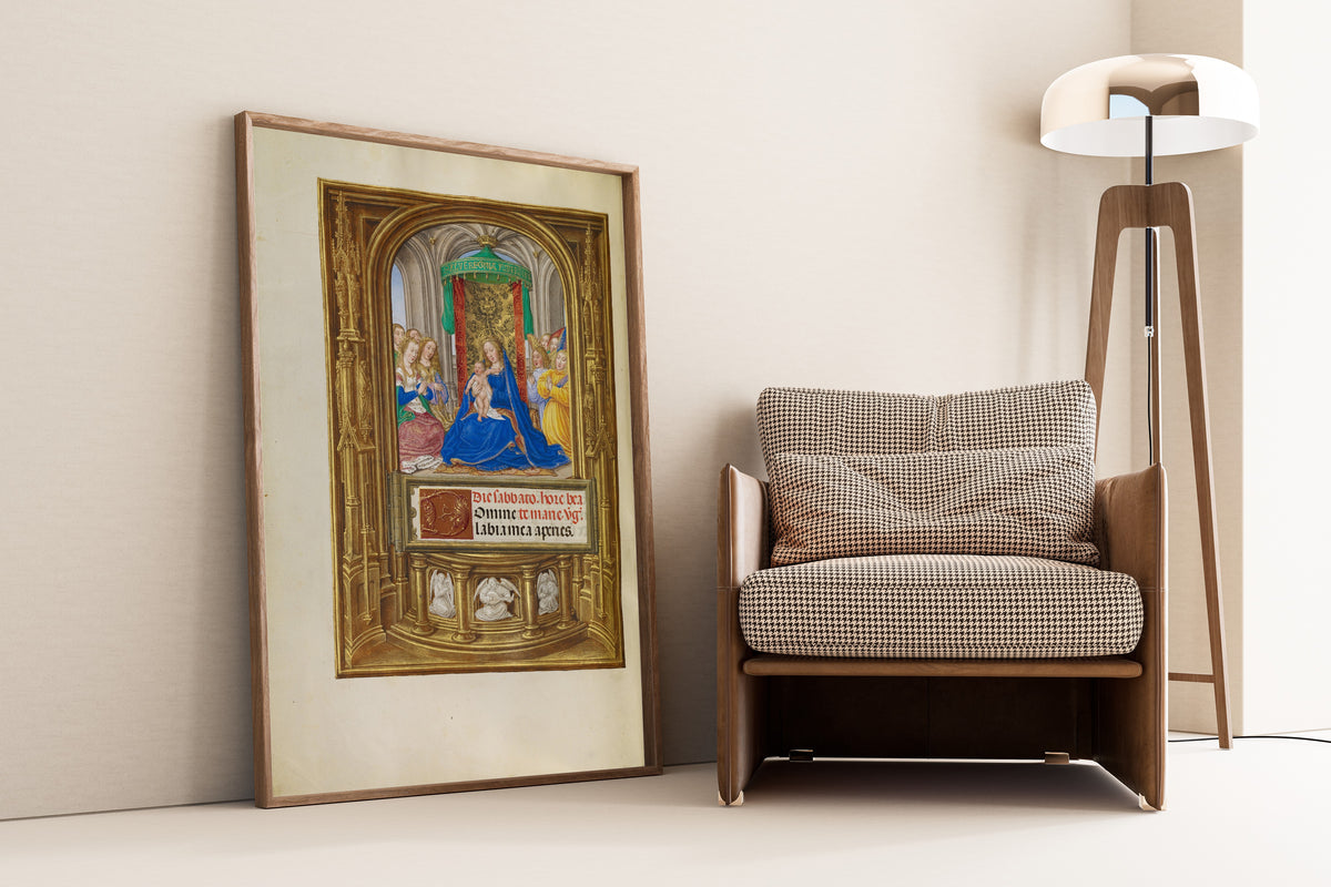 Framed art print of Spinola Hours: The Virgin and Child Enthroned by Master of James IV of Scotland, leaning against a wall beside an armchair and a floor lamp
