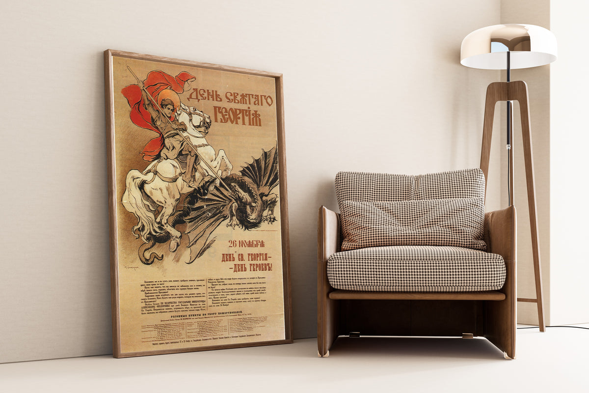 Framed art print of St George's Day by Nikolai Samokysh, leaning against a wall beside an armchair and a floor lamp