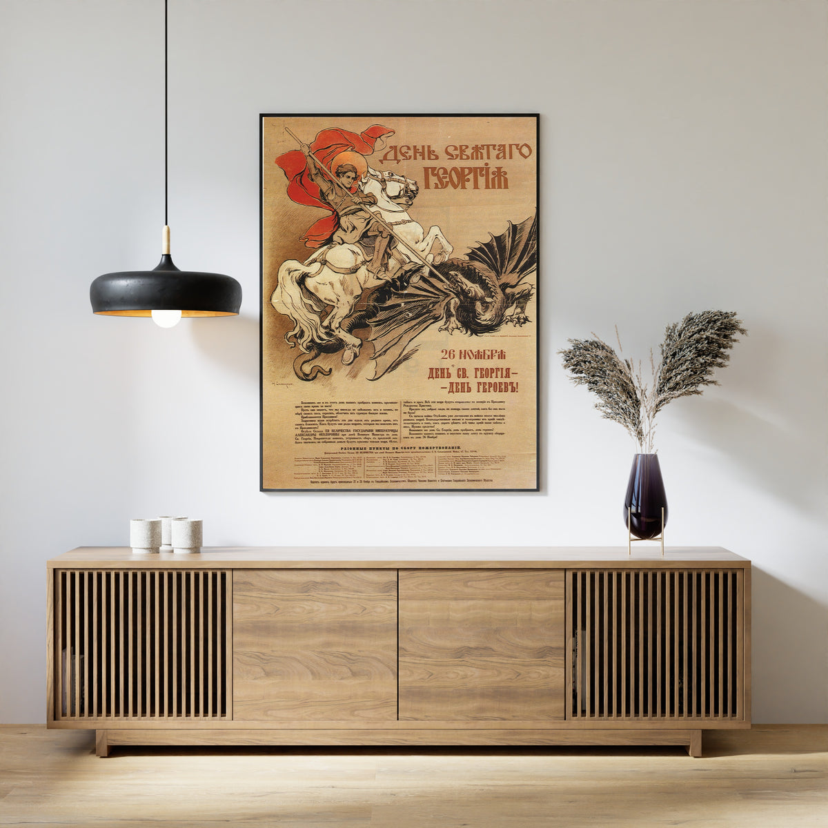 Framed art print of St George's Day by Nikolai Samokysh, above a slatted wood sideboard