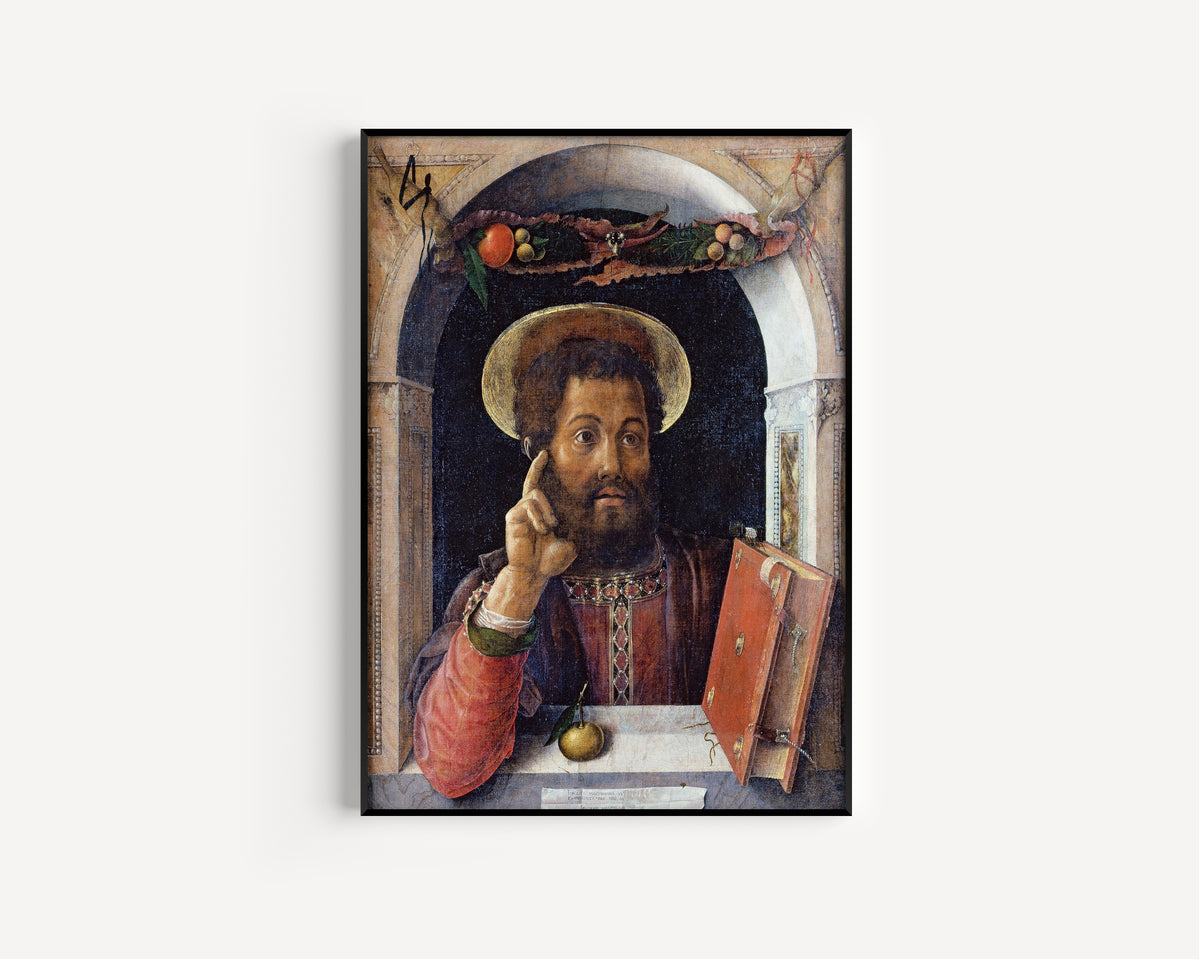 Framed art print of St Mark the Evangelist by Andrea Mantegna, in a slim black frame on a plain white wall