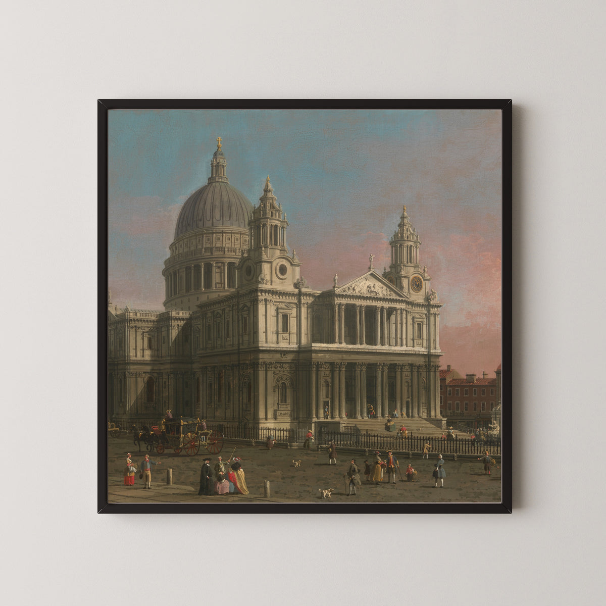 Framed art print of St. Paul’s Cathedral by Canaletto, in a black frame on a pale wall