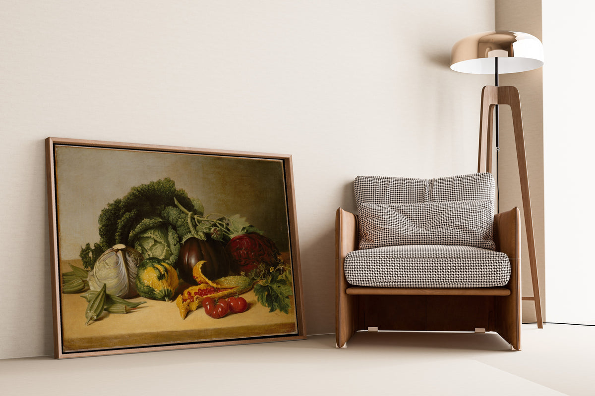 Still Life: Balsam Apple and Vegetables by James Peale — framed and leaning against a wall beside an armchair and a floor lamp