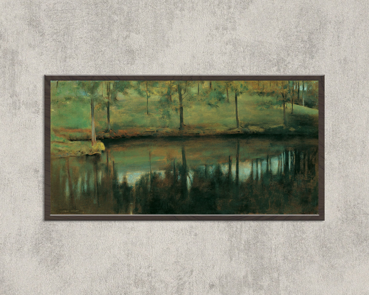 Framed art print of Still Water by Fernand Khnopff, in a wide black frame on a concrete wall